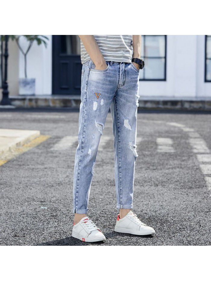 Spring and summer new fashion brand pierced jeans men's Korean slim pants men's trend youth casual Capris 