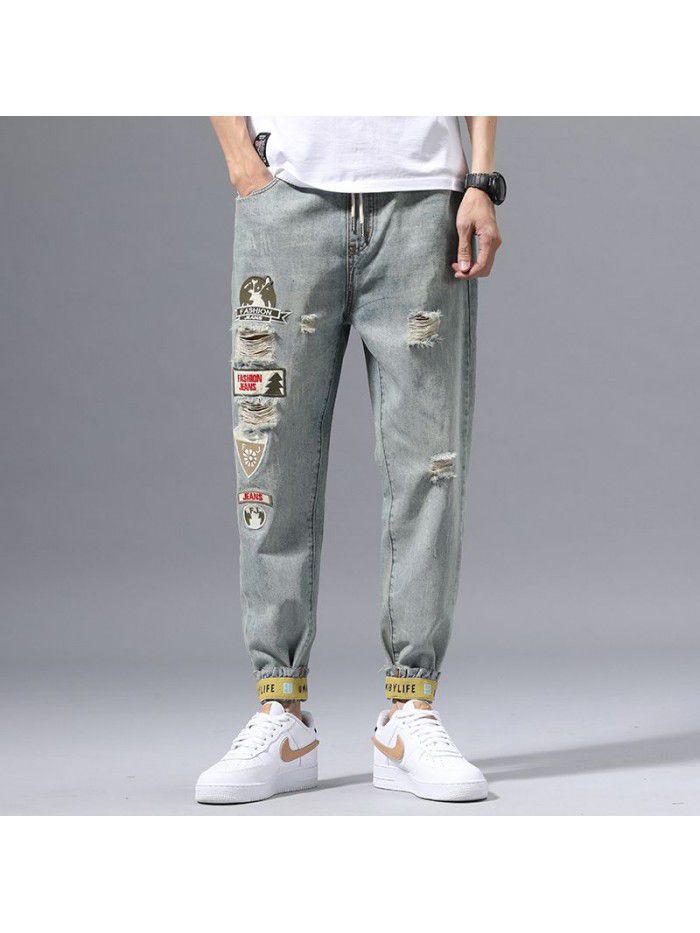 Holed jeans men's spring new fashion brand Slim small leg Harem Pants men's fashion casual corset Capris 