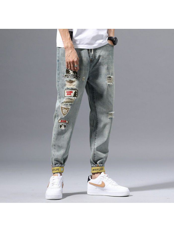 Holed jeans men's spring new fashion brand Slim small leg Harem Pants men's fashion casual corset Capris 