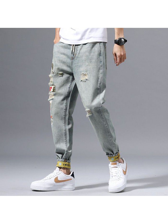Holed jeans men's spring new fashion brand Slim small leg Harem Pants men's fashion casual corset Capris 