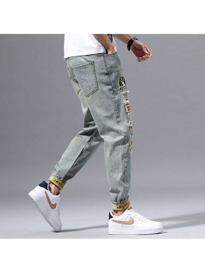 Holed jeans men's spring new fashion brand Slim small leg Harem Pants men's fashion casual corset Capris 
