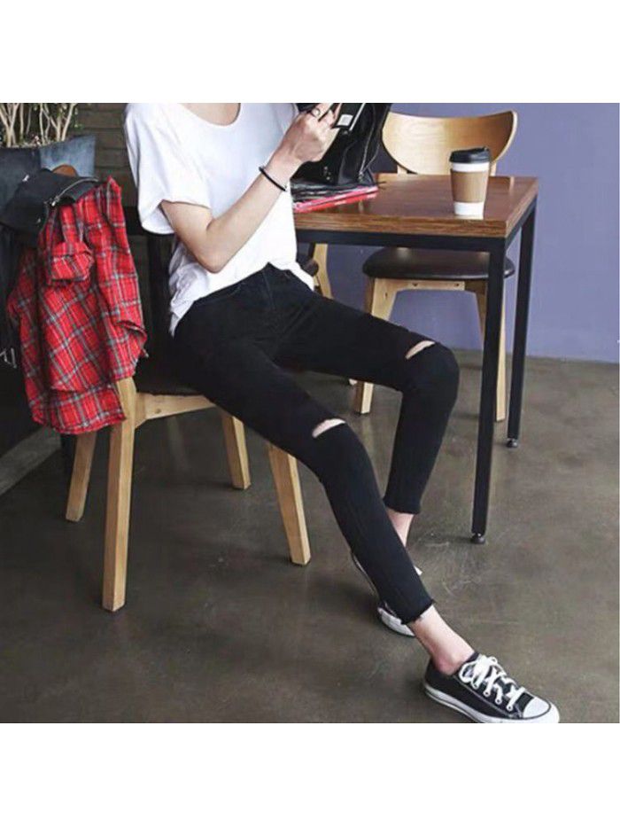 Black jeans, women's small feet, raw edge, Capris, Korean version, showing the trend of thin high waist elastic tight, holed Capris 