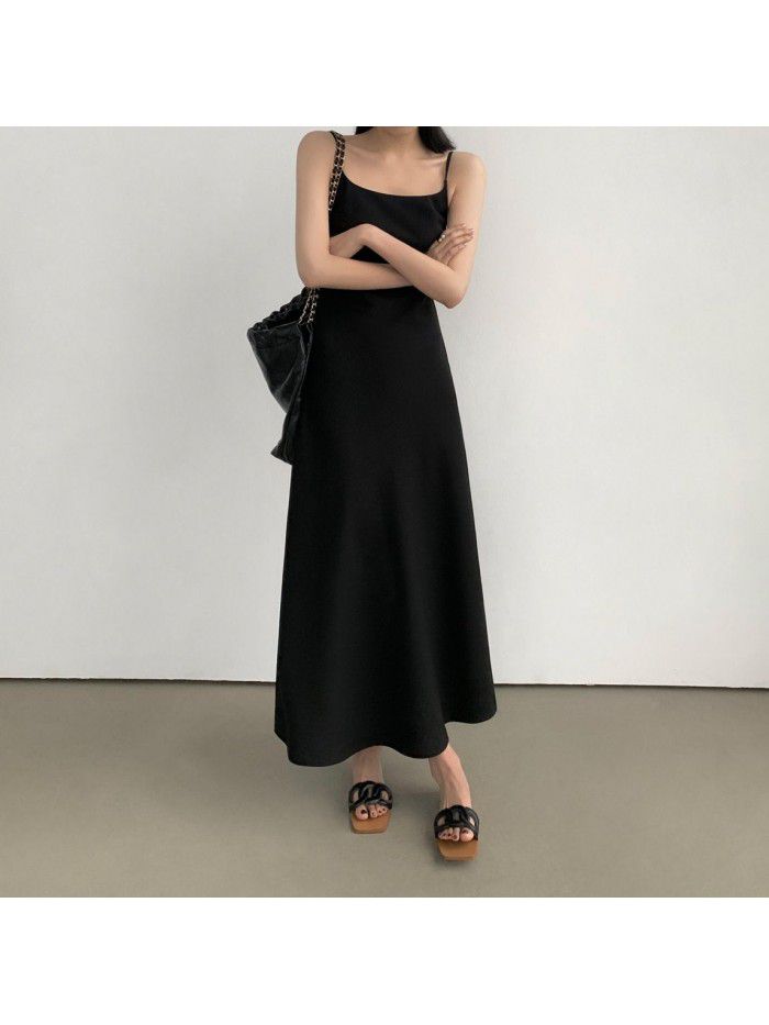 Black French suspender dress for women's new minimalist style diagonal cut long skirt  Black French suspender dress for women's new minimalist style diagonal cut long skirt