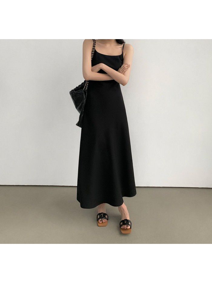 Black French suspender dress for women's new minimalist style diagonal cut long skirt  Black French suspender dress for women's new minimalist style diagonal cut long skirt